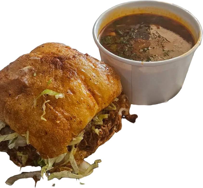 A Birria Bite: birria on a toasted roll with shredded lettuce, and a cup of consommé